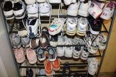 Womens Dress Shoes, Tennis Shoes, Boots, and Misc. Women's Shoes, and (2) Shoe Racks