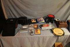 DVD Cases, Belmont Binoculars, Kodak Record Player, DVD Player, Clock Radio, Headphones, Camera Bag, and Misc.