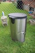 Sunbeam Grill, Rubbermaid Trash Can, Gott Cooler, and Simply 10.5 Gallon Metal Trash Can