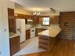 PARCEL 1: LOG HOME - BASEMENT - GARAGE - 1.2 ACRES: 487 Quiggins Lane, Leitchfield, KY 42754