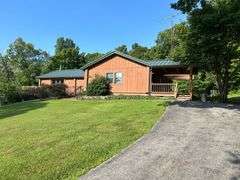 PARCEL 1: LOG HOME - BASEMENT - GARAGE - 1.2 ACRES: 487 Quiggins Lane, Leitchfield, KY 42754