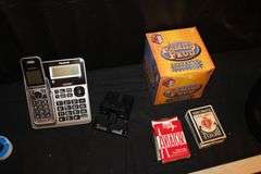 Po-Ke-No Game, How to Play Books, Family Feud Game, Bowling Balls, Suitcase, Playing Cards, Football, Desk Lamp, and Misc.