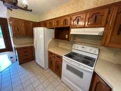 PARCEL 1: LOG HOME - BASEMENT - GARAGE - 1.2 ACRES: 487 Quiggins Lane, Leitchfield, KY 42754