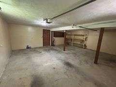PARCEL 1: LOG HOME - BASEMENT - GARAGE - 1.2 ACRES: 487 Quiggins Lane, Leitchfield, KY 42754