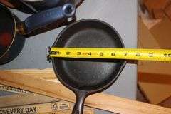 6.5 Inch Number 3 Cast Iron Skillet, Calphalon Skillet, (2) Coffee Makers, Strainers, Pots with Lids, and Misc.
