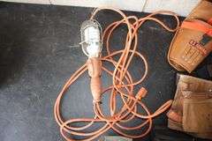 Box of Ear Plugs, Shop Light, Knee Pads, Tool Belts, and Downspout Strainer