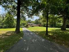 PARCEL 1: LOG HOME - BASEMENT - GARAGE - 1.2 ACRES: 487 Quiggins Lane, Leitchfield, KY 42754