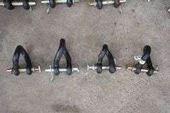 (3) 1 x 5 5/16 Clevises, (4) Twisted Clevises, 15/16 x 4 5/8 Clevis, and 7/8 x 3 1/4 Clevis