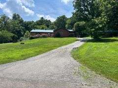 PARCEL 1: LOG HOME - BASEMENT - GARAGE - 1.2 ACRES: 487 Quiggins Lane, Leitchfield, KY 42754