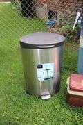 Sunbeam Grill, Rubbermaid Trash Can, Gott Cooler, and Simply 10.5 Gallon Metal Trash Can