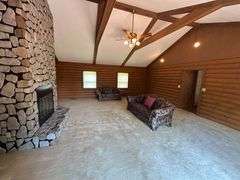 PARCEL 1: LOG HOME - BASEMENT - GARAGE - 1.2 ACRES: 487 Quiggins Lane, Leitchfield, KY 42754