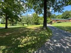 PARCEL 1: LOG HOME - BASEMENT - GARAGE - 1.2 ACRES: 487 Quiggins Lane, Leitchfield, KY 42754