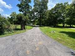 PARCEL 1: LOG HOME - BASEMENT - GARAGE - 1.2 ACRES: 487 Quiggins Lane, Leitchfield, KY 42754