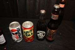 Drummer Figurine, Coasters, Soda Cans, and Misc. Glass Bottles