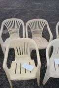(5) Plastic Chairs and (2) Tables