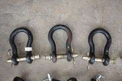 (3) 1 x 5 5/16 Clevises, (4) Twisted Clevises, 15/16 x 4 5/8 Clevis, and 7/8 x 3 1/4 Clevis