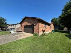 HOME - ATTACHED GARAGE - CITY LOT
