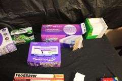 Reynolds Wrap, Swiffer Pads, Mr. Clean Magic Erasers, Pack Mate Vacu-Seal, Size Medium Rubber Gloves, and Misc.