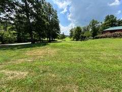 PARCEL 1: LOG HOME - BASEMENT - GARAGE - 1.2 ACRES: 487 Quiggins Lane, Leitchfield, KY 42754