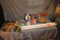 Fluorescent Light Fixture, Electrical Cords, EZ Cart Seat, Hanger Brackets, Flood Light, Air Duster, Smoke and Fire Alarm, 3/8 Inch Staples, and Misc.