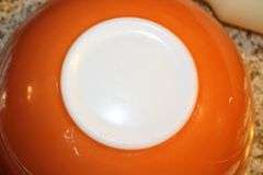 Pyrex Mixing Bowls, Plastic Measuring Cups, Glass Bowls, Strainer, (2) Sifters, Biscuit Cutters, and Misc.