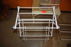 Wicker Coffee Table, Folding Shoe Rack, 4 Drawer Plastic Container, 2 Tier Rack, 4 Tier Rack, and 7 Drawer Cart on Wheels