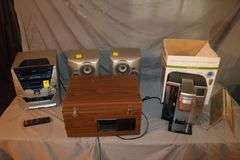 RCA 5 Disc Changer Stereo, (2) RCA Speakers, AKAI X-2000s Integrated Circuit Tape Reel, and Cuisinart Coffee Maker