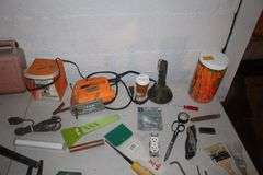 (2) Gas Cans, Yard Stick, Pliers, Screwdrivers, Hand Saw, Chicago Electric Jigsaw, Caulk Gun, and Misc.