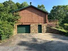 PARCEL 1: LOG HOME - BASEMENT - GARAGE - 1.2 ACRES: 487 Quiggins Lane, Leitchfield, KY 42754