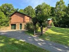 PARCEL 1: LOG HOME - BASEMENT - GARAGE - 1.2 ACRES: 487 Quiggins Lane, Leitchfield, KY 42754