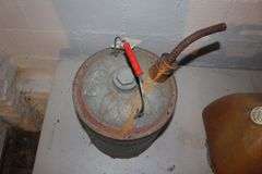 Propane Cooker Stand, Metal Fuel Can, and 5 Gallon Plastic Gas Can