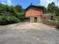 PARCEL 1: LOG HOME - BASEMENT - GARAGE - 1.2 ACRES: 487 Quiggins Lane, Leitchfield, KY 42754