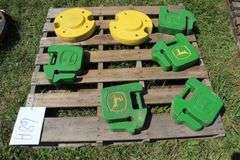 (5) 40 Lb. John Deere Tractor Weights, and (2) 50 Lb. John Deere Rear Wheel Weights