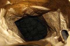 (2) Folding Cots, Standing Heater, Fan, Metal Flower Stand Bench, Kingsford Charcoal, and Type 1 Tile Adhesive