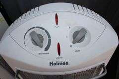 Everglow Kerosene Heater and Holmes Electric Heater