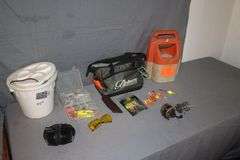 (2) Minnow Buckets, Zebco Omega Reel, PFlueger Reel, Ear Muffs, Bobbers, and Misc. Fishing Tackle