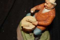 Drummer Figurine, Coasters, Soda Cans, and Misc. Glass Bottles