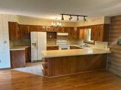 PARCEL 1: LOG HOME - BASEMENT - GARAGE - 1.2 ACRES: 487 Quiggins Lane, Leitchfield, KY 42754