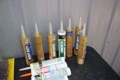 Caulk, Caulk Guns, Brushes, Taping Knives, Dust Pans, Sand Paper, Blades, and Misc.