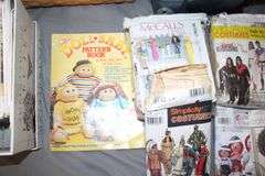 Craft Patterns, Ironing Board, and (2) Baskets