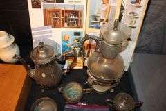 Lasonic Digital to Analog Converter, Marbles, Wooden Utensil Organizer, Decanters, Cleaning Supplies, Coasters, Bracelets, Necklaces, Silver Plate Cups and Pitcher, Silver Plate Canisters, Smart Shelf, and Misc.