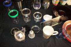 Magic Bullet Mixer, Magic Bullet Mixer Cups, Sheffield Decorative Plates, Coffee Mugs, Spatulas, Tongs, Plastic Cups, Ice Tray, and Misc.