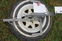 Champion High Fly Target Thrower Mounted on a CLM ST F78-14 Tire