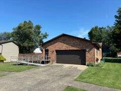 HOME - ATTACHED GARAGE - CITY LOT