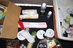 (2) Yard Sticks, Golf Club Grips, Mens Small and Womens Large Golfing Gloves, Peg Board Pegs, Fabric, Claw Hammer, Ribbon, Crafting Supplies, and Misc.