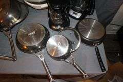 6.5 Inch Number 3 Cast Iron Skillet, Calphalon Skillet, (2) Coffee Makers, Strainers, Pots with Lids, and Misc.