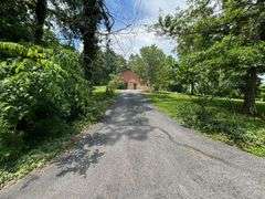 PARCEL 1: LOG HOME - BASEMENT - GARAGE - 1.2 ACRES: 487 Quiggins Lane, Leitchfield, KY 42754