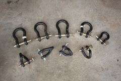 (3) 1 x 5 5/16 Clevises, (4) Twisted Clevises, 15/16 x 4 5/8 Clevis, and 7/8 x 3 1/4 Clevis