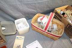 Sewing Thread, Gorilla Glue, Plastic Bolt Bin, Buttons, Table Cloths, Sewing Machine Parts, Gift Tags, and Misc.