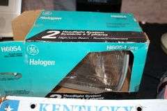 (3) Pairs ID Sawhorse Legs, Thorsen Allied Tool Kit, Pliers, Screwdrivers, License Plates, Halogen Headlight, Le Presse Food Slicer, Jacket, and Misc.